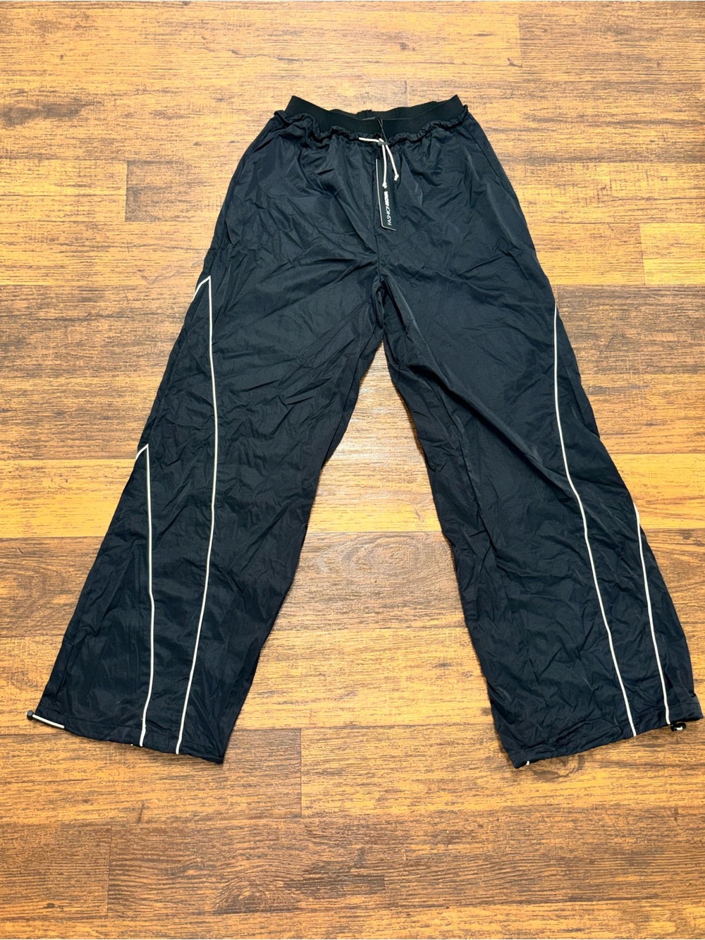 Fashion Nova Black Wide-Leg Track Pants with White Piping
